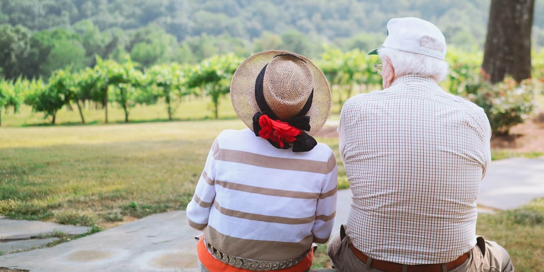 senior couple sitting in the park