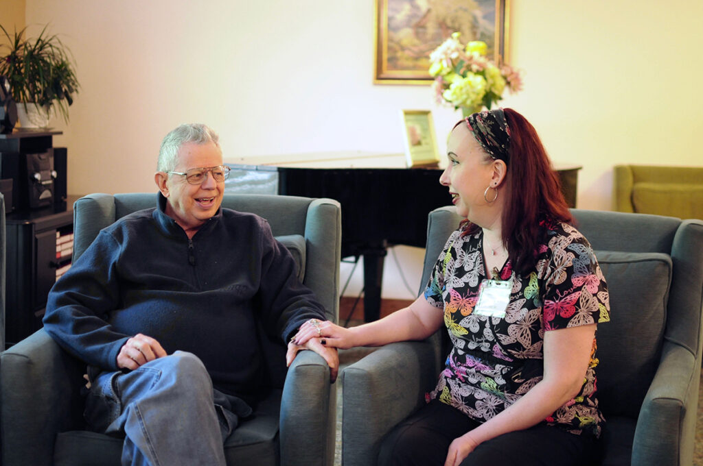 CH staff member and resident interacting. Blog - What is Assisted Living?